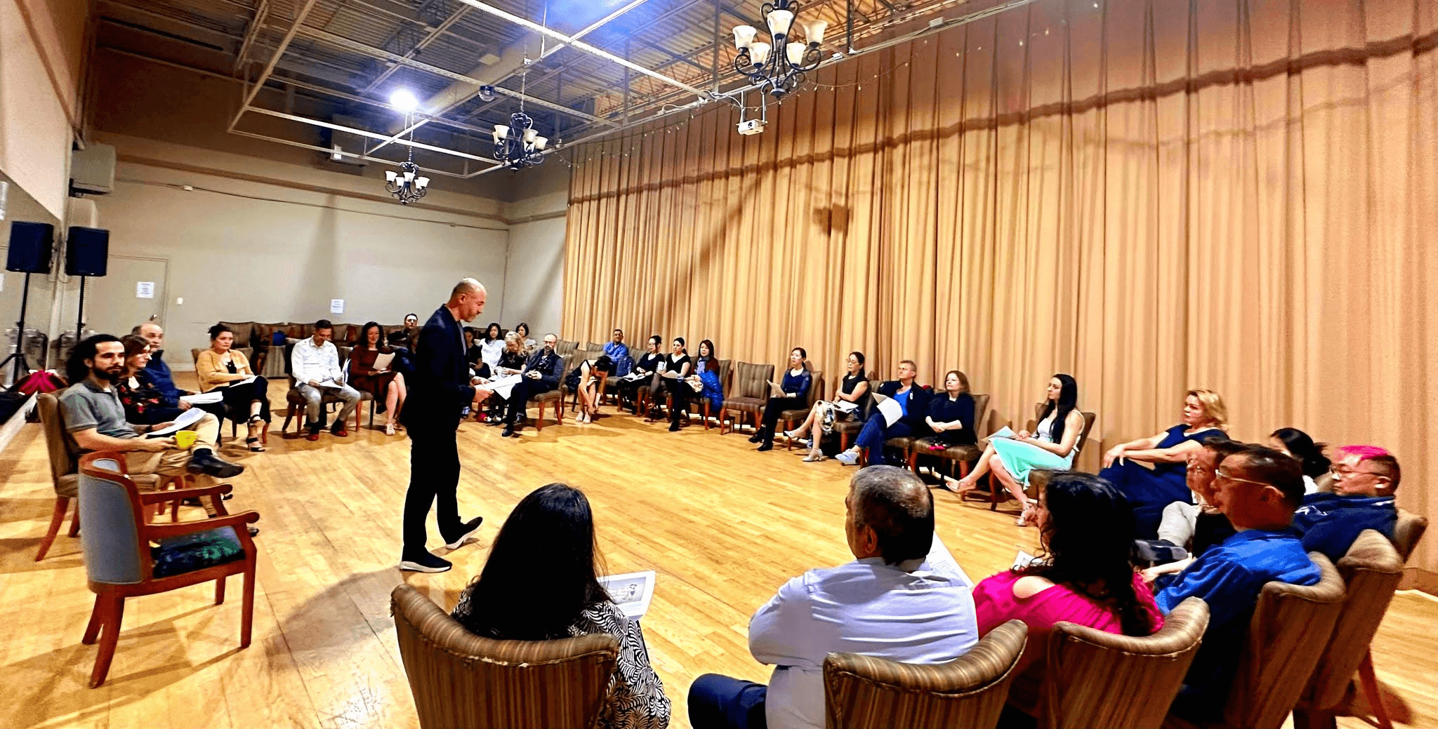 Tango Pi instructor leading a class conversation in the studio