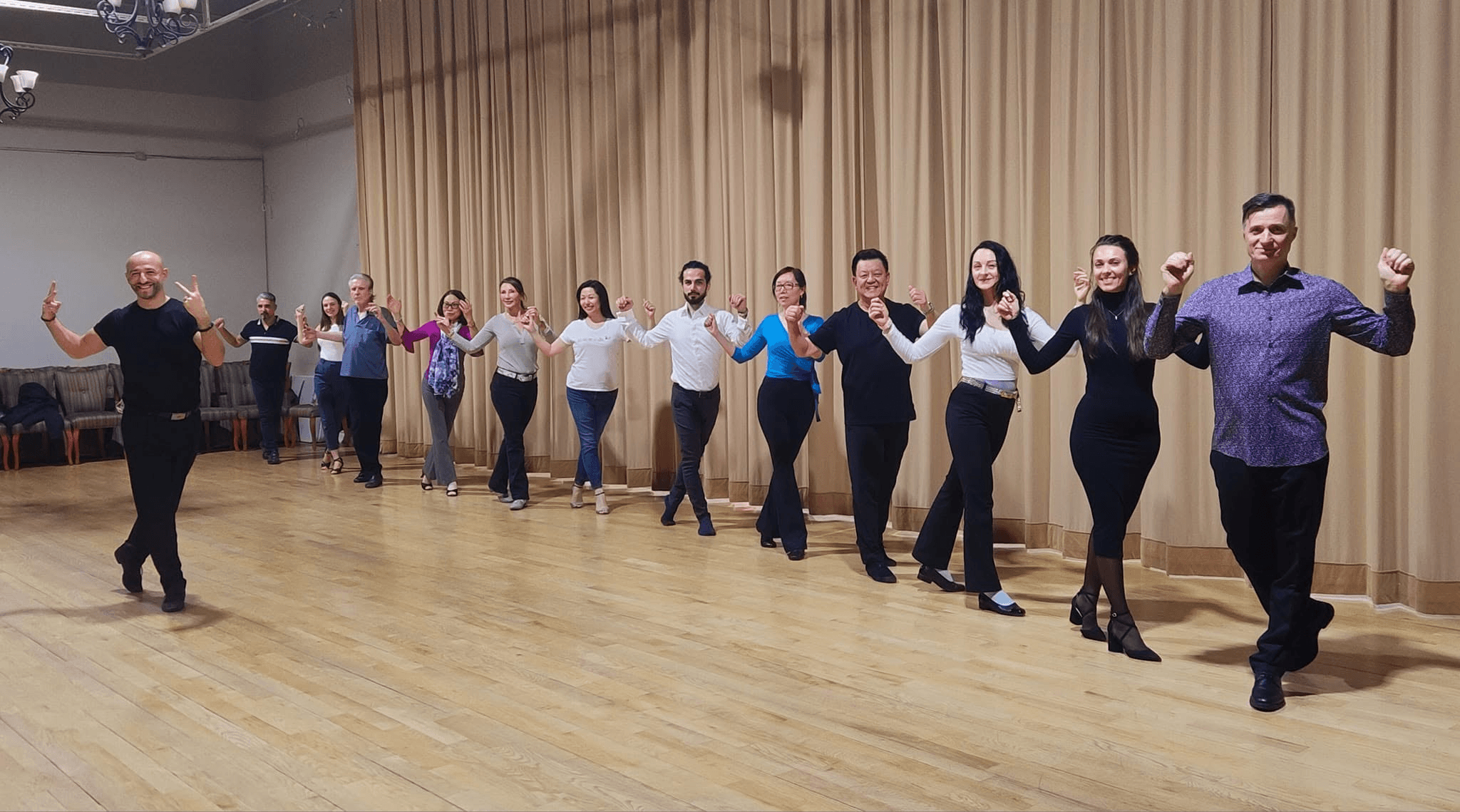 Tango Pi students moving together in class at DanceMania