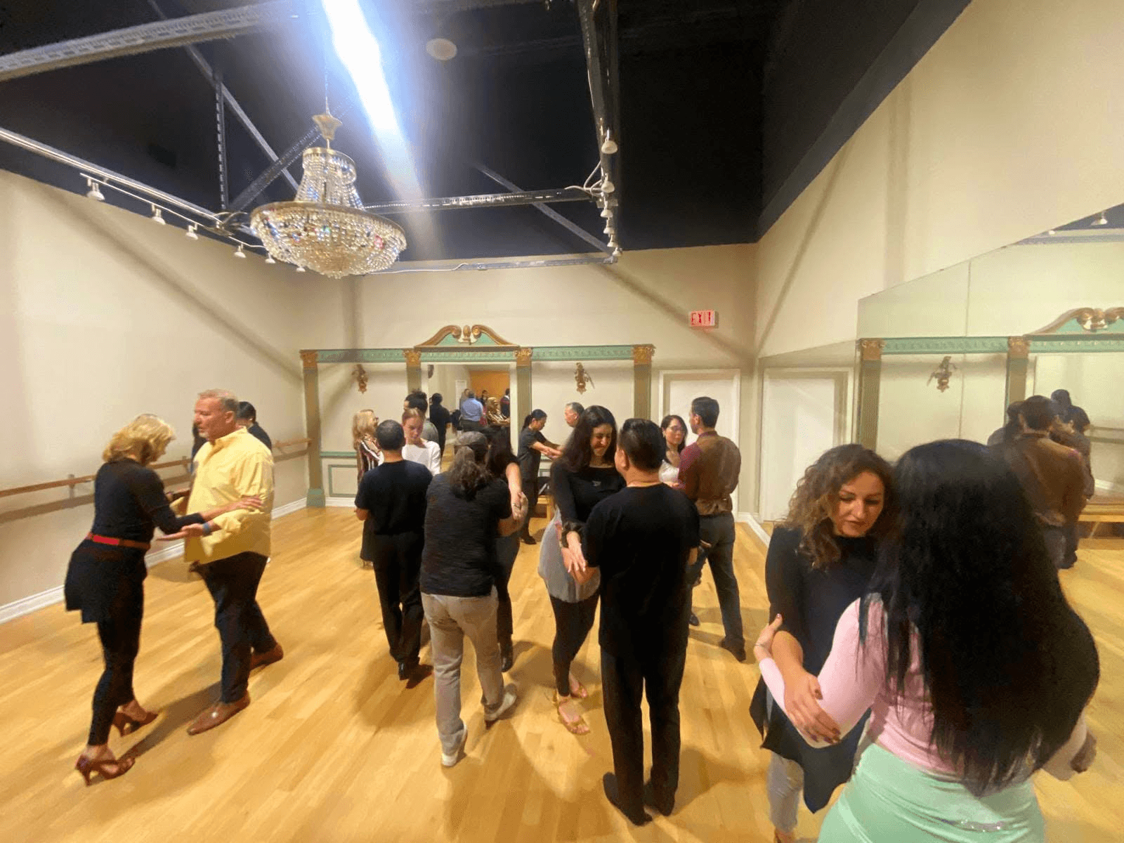 Tango Pi students dancing together during a social class